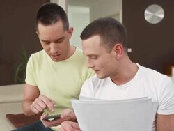 HD: Gay Couple Calculating Their Finances Stock Footage