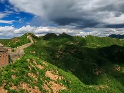 T/L WS HA PAN The Great Wall under rolled clouds / Beijing, China Stock Footage