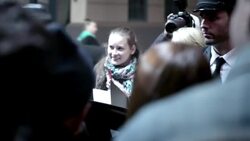 Paparazzi snap photos as celebrity couple exit limousine and walk red carpet at awards show Stock Footage