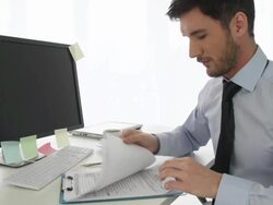Businessman looking at tax forms Stock Footage