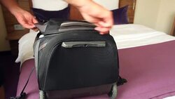Unpack your baggage in a hotel Stock Footage