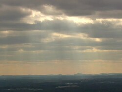 WS AERIAL View of sunshine coming out from clouds / North Carolina, United States Stock Footage