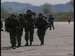 ALBANIA: TIRANA: MULTINATIONAL SECURITY MISSION: GREEK TROOPS ARRIVE News Clip