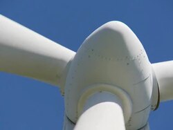 Wind turbine against blue sky, close up, Spain Stock Footage