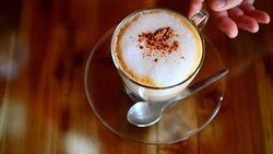 Coffee on the wood texture table at coffee cafe Stock Footage
