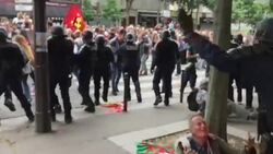 Protesters and police clash in Paris Instructional Video