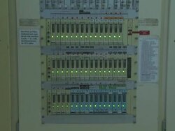 Electrical panel with green lights on ship'd bridge, Australia Stock Footage