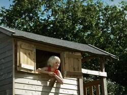 Boy in tree house (Shot on Red) Stock Footage