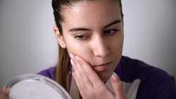 Woman applying powder Stock Footage