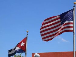 US and Cuban Flags Stock Footage