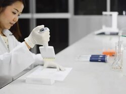close up : scientist use micropipette Stock Footage