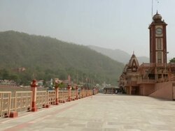 Temples at riverside, Ganges River, Rishikesh, Uttarakhand, India Stock Footage