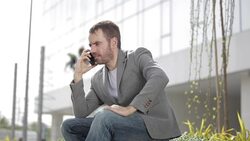 Angry businessman Using phone Stock Footage