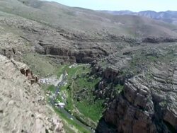  WS AERIAL ZI TU PAN View of  wadi desert / Qumran,  Norrn Judea Desert, Israel Stock Footage