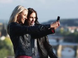 women taking a photo with a cell phone camera Stock Footage