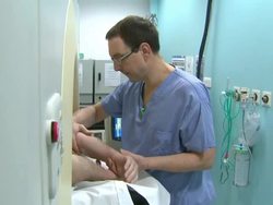 Patient Having CT Scan News Clip