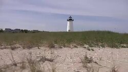 Lighthouse Behind Beach Grass Stock Footage