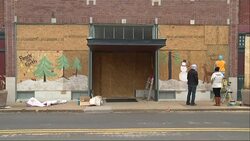 Ferguson residents on Wednesday were boarding up and cleaning up after two nights of unrest after a grand jury decision not to indict a police officer in the shooting death of 18-year-old Michael Brown. (Nov. 26) News Clip
