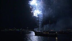 Colorful fireworks explode over Sydney Harbor during a New Year's Eve celebration. Stock Footage