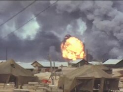 Amateur Vietnam Marine Footage of distant airborne mortar fire, bright firey explosions and plumes of fire and smoke. Stock Footage