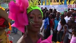 Revellers attend Carnaval des Fleurs parade News Clip