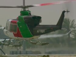 MS TS Shot of helicopter landing on airport / Qatar Stock Footage