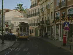 MS POV Tram and car on street in Graca District / Lisbon, Portugal Stock Footage