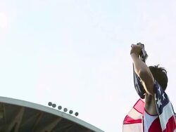 CU LA TS Shot of US athlete with national flag / Tokyo, Japan Stock Footage