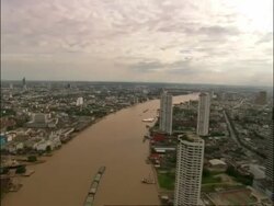 Aerial over Bangkok and river, Bangkok, Thailand Stock Footage