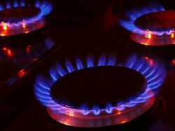 Timelapse close up and rotate of burning gas rings on a natural gas cooker Stock Footage