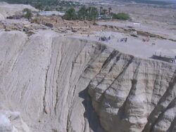 Aerial the ruins of Qumran in the Judea Desert near the Dead sea, Israel Stock Footage