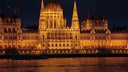 Hungarian Parliament Building & River Danube at Dusk, Budapest, Hungary, Europe Stock Footage