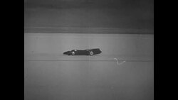 1935: Sir Malcolm Campbell and 'Bluebird' attempt land speed record; Amelia Earhart arrives in Oakland News Clip