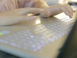 woman Typing at Keyboard,Dolly shot Stock Footage