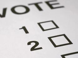 Voting putting a cross in a box. Stock Footage