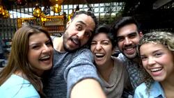 Friends taking a selfie at a restaurant Stock Footage