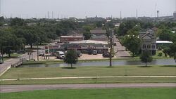 New Orleans highway, gas station and levee News Clip