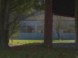 two women running fast as camera pans with them, they dance at end Stock Footage