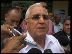 WRAP Polls open in presidential elex, voting ADDS Micheletti voting News Clip