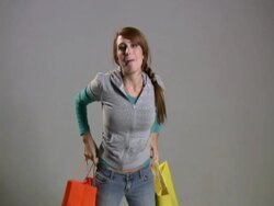 Happy Woman Adjusts Clothing Stock Footage