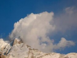 T/L clouds over Tolma peak, India Stock Footage