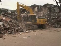 WRAP Search for survivors in collapsed hotel, aerials, swiss rescue team News Clip