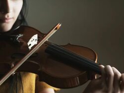 woman playing the violin Stock Footage