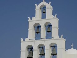 MS Shot of white church with bells / Fira, Santorini, Greece Stock Footage
