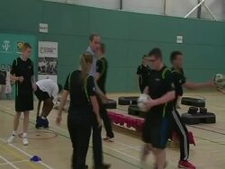 William playing football during coaching drill News Clip