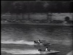 First snapshot is outboard international streaking over Seine in pursuit of Trophy. News Clip
