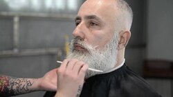 brutal barber clipper mows bearded adult senior hipster Stock Footage