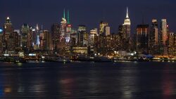 Manhattan, view of the Empire State Building and Midtown Manhattan across the Hudson River, New York, United States of America - Time lapse Stock Footage