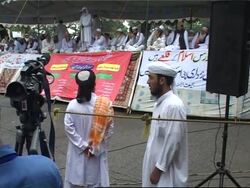 Thousands mark anniversary of crackdown on radical Red Mosque News Clip