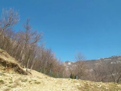 HD: Mountain Bikers Jumping Over Camera Stock Footage